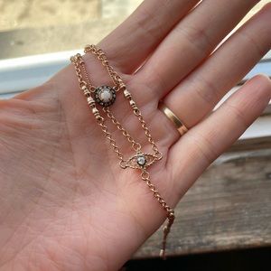 Kendra Scott rose gold lariat necklace.